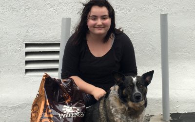 Ashlyn & Cleo smiling after receiving dog food provided by K9 Connection & the NKLA Coalition for Shelters & Rescues!